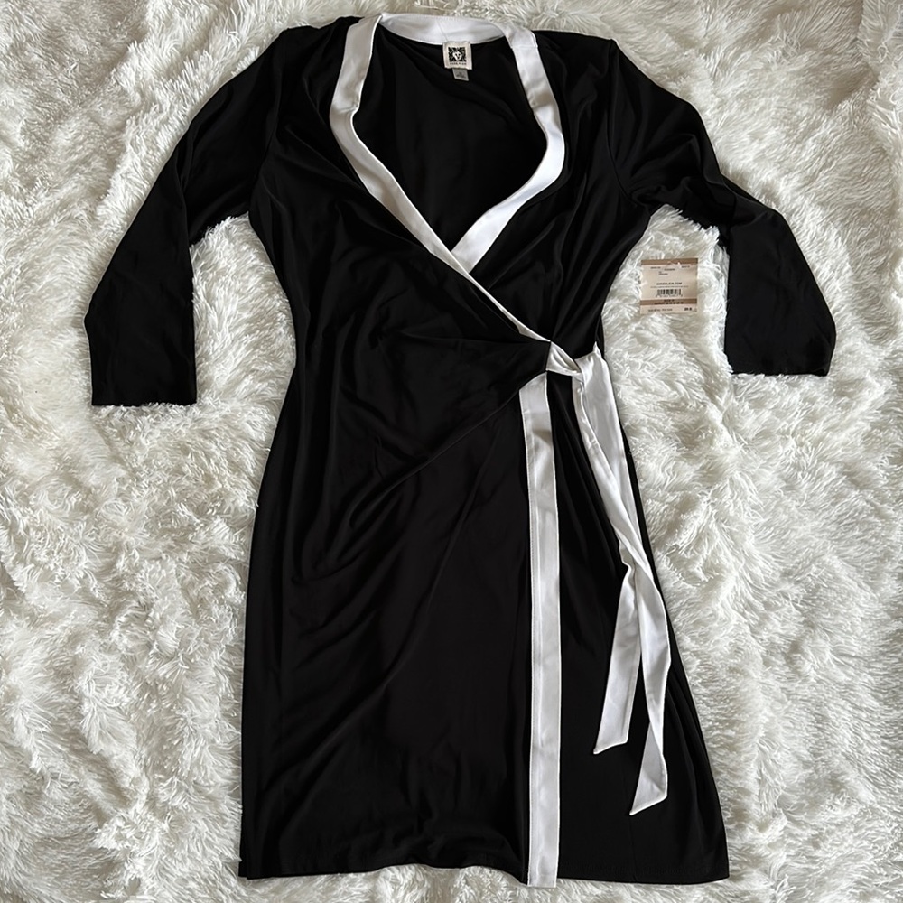 Elegant Black Wrap Dress with White Trim